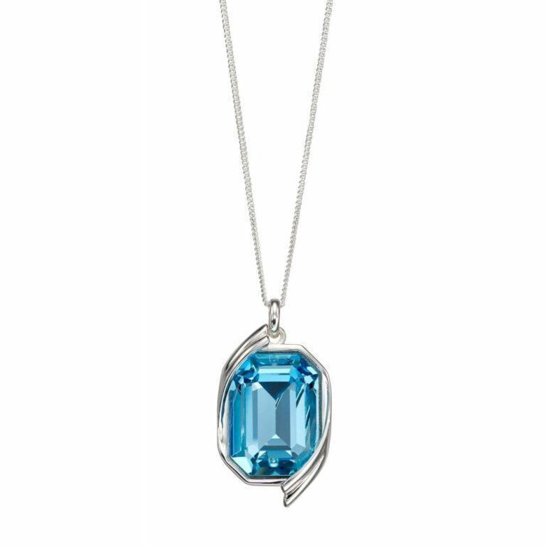 Pisces Birthstone Joshua James Aquamarine Abstract Crystal Pendant with sterling silver framing. 
