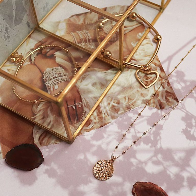 Still life photo of ChloBo rose gold necklace and two bracelets