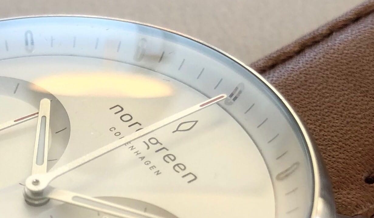 Close up of Nordgreen Pioneer watch dial, featuring sapphire crystal