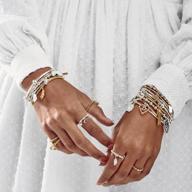 Slow Fashion Woman Wearing ChloBo Stacking Bracelets and Rings