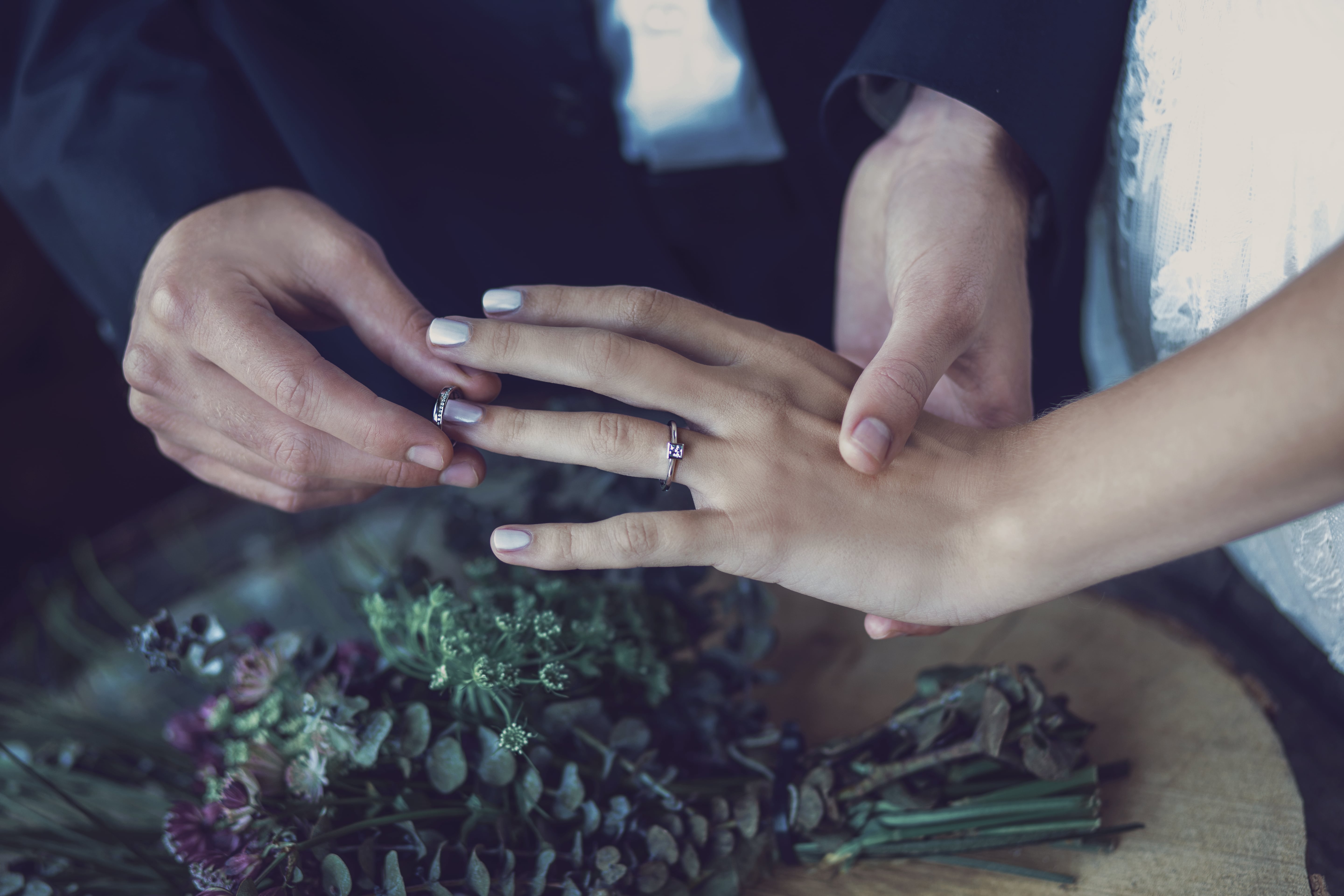 Bespoke Jewellery UK Wedding Ring Being Placed on Bride
