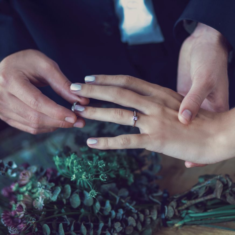 Bespoke Jewellery UK Groom Putting on Brides Bespoke Ring