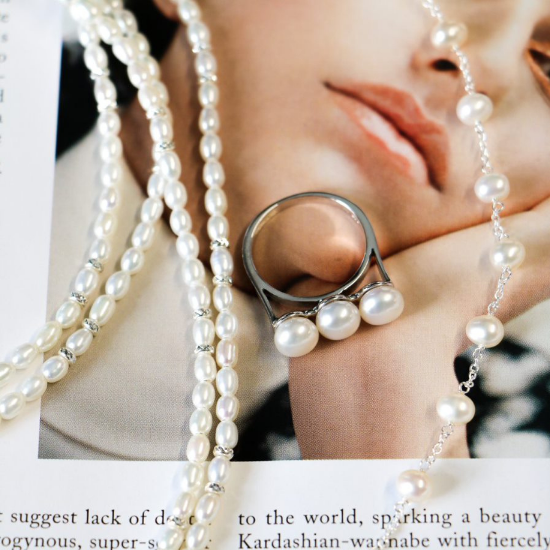 Pearl Jewellery Set on a Magazine